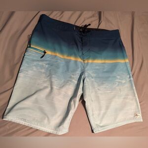 O'Neill Blue and Yellow Board Shorts Gradient Design